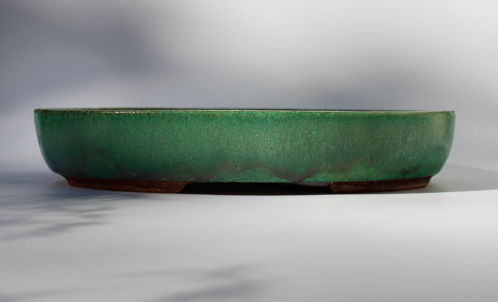 Oval bonsai pot in a matte copper green glaze 324x232mm
