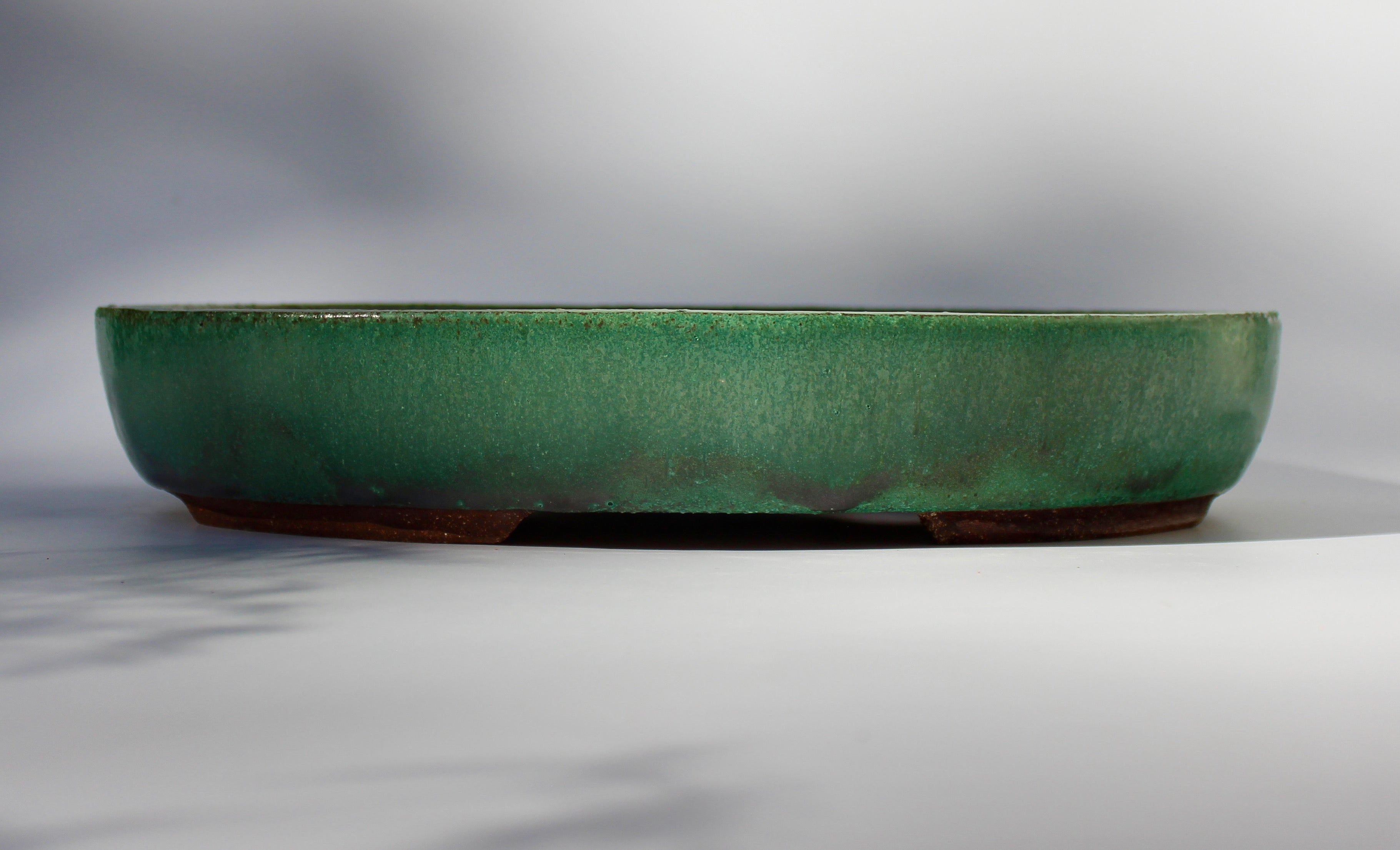 Oval bonsai pot in a matte copper green glaze 324x232mm