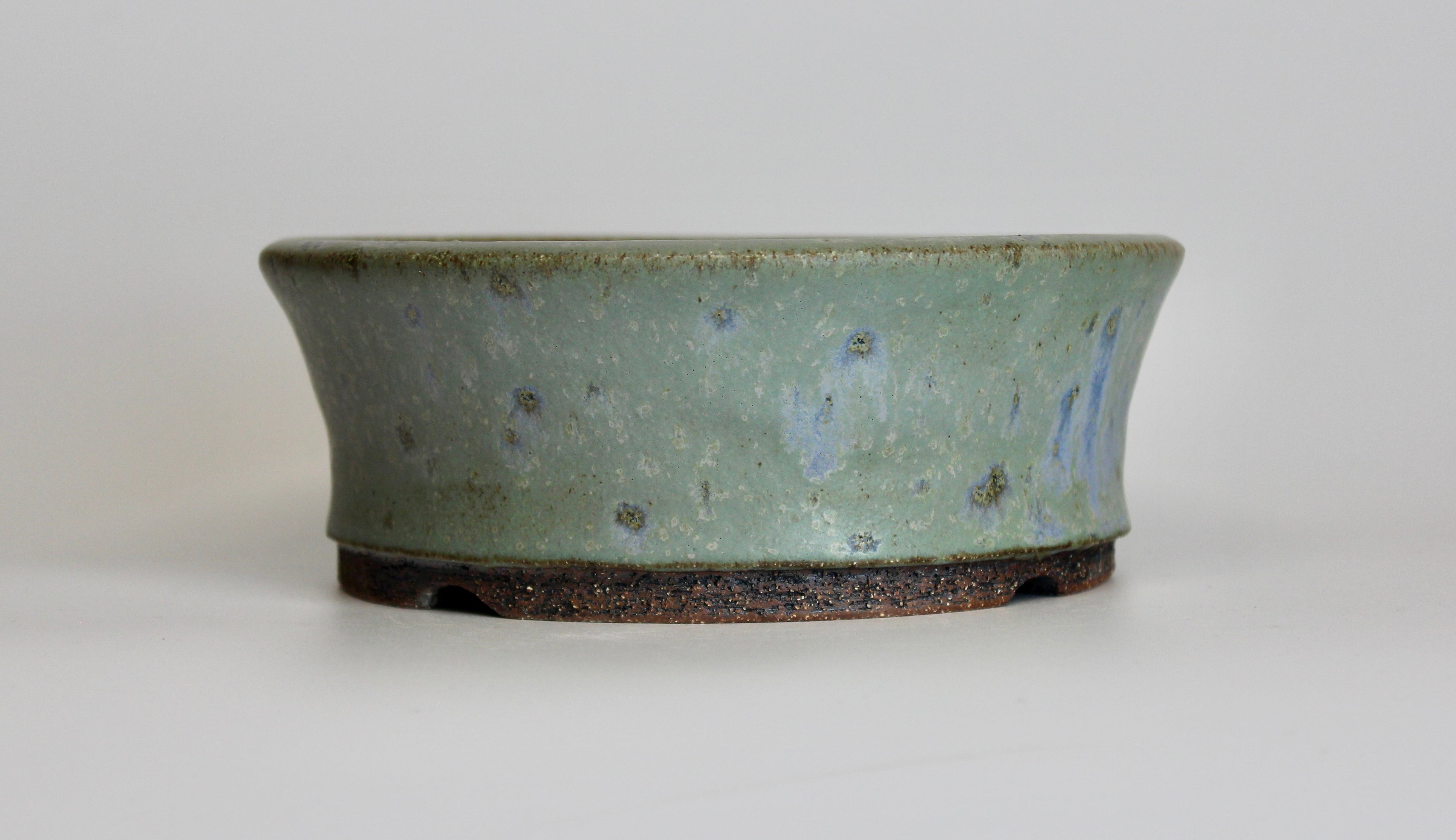 Round bonsai pot in a matte blue glaze. D.164mm