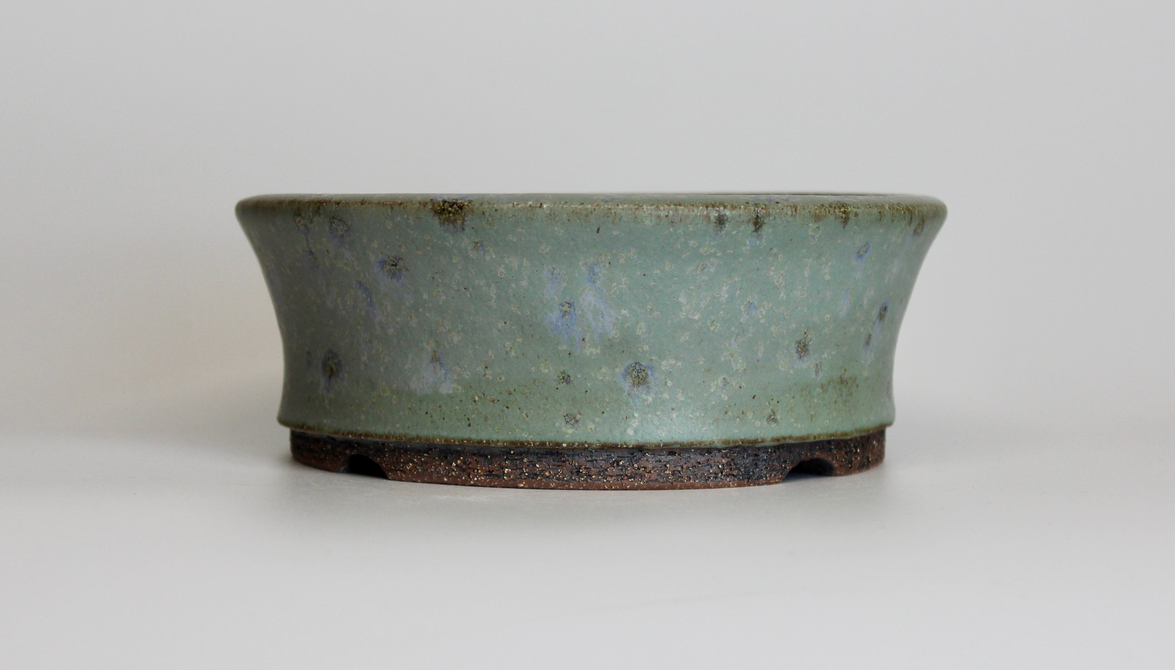 Round bonsai pot in a matte blue glaze. D.164mm