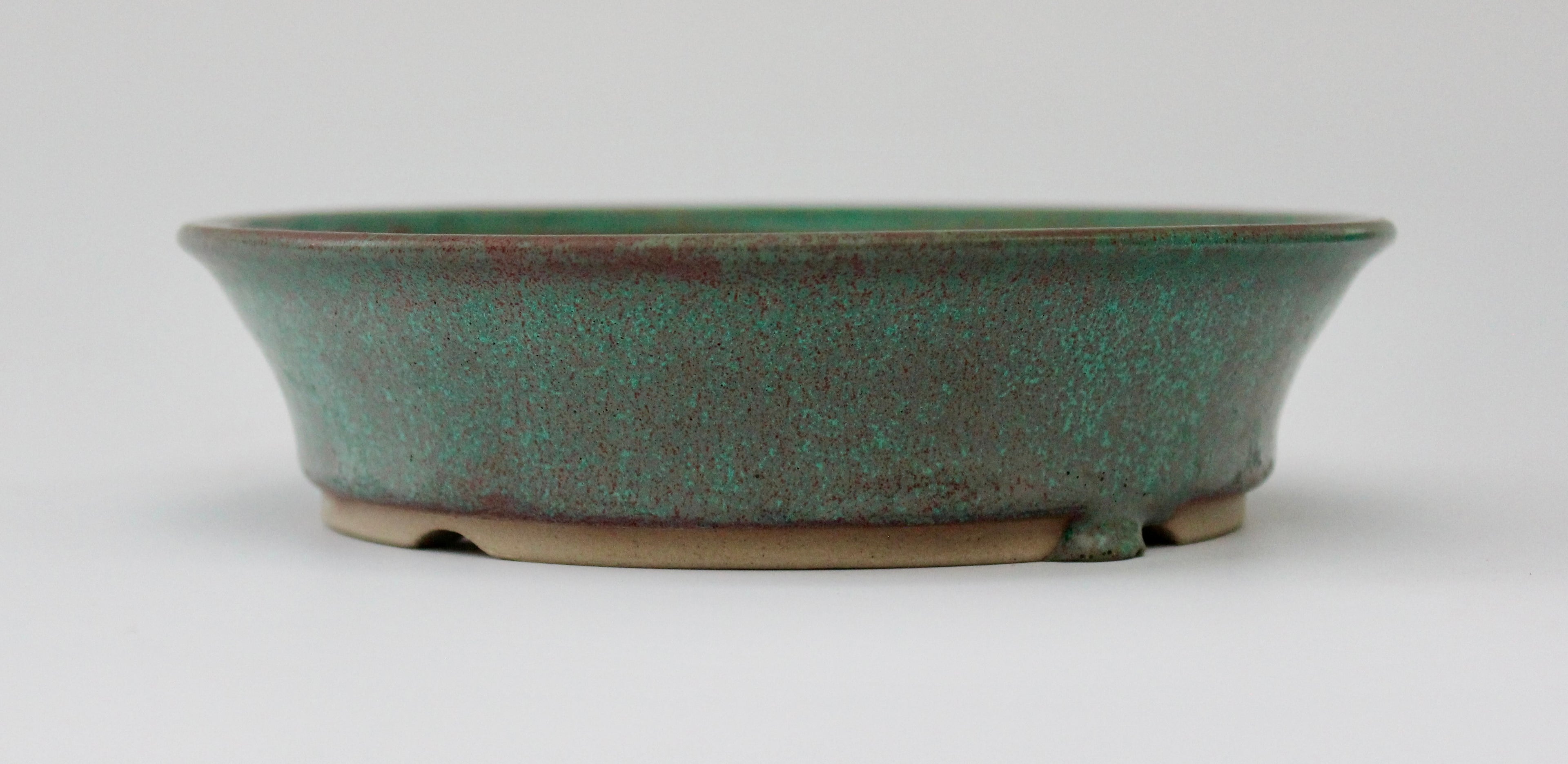 Round bonsai pot in a matte copper glaze. D.171mm