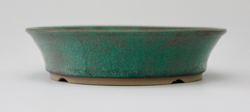 Round bonsai pot in a matte copper glaze. D.171mm