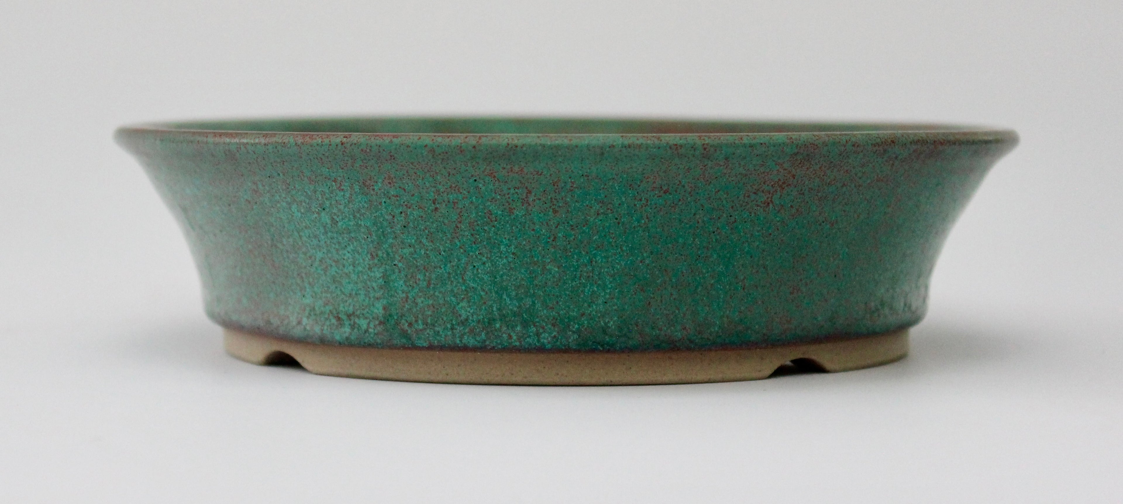 Round bonsai pot in a matte copper glaze. D.171mm