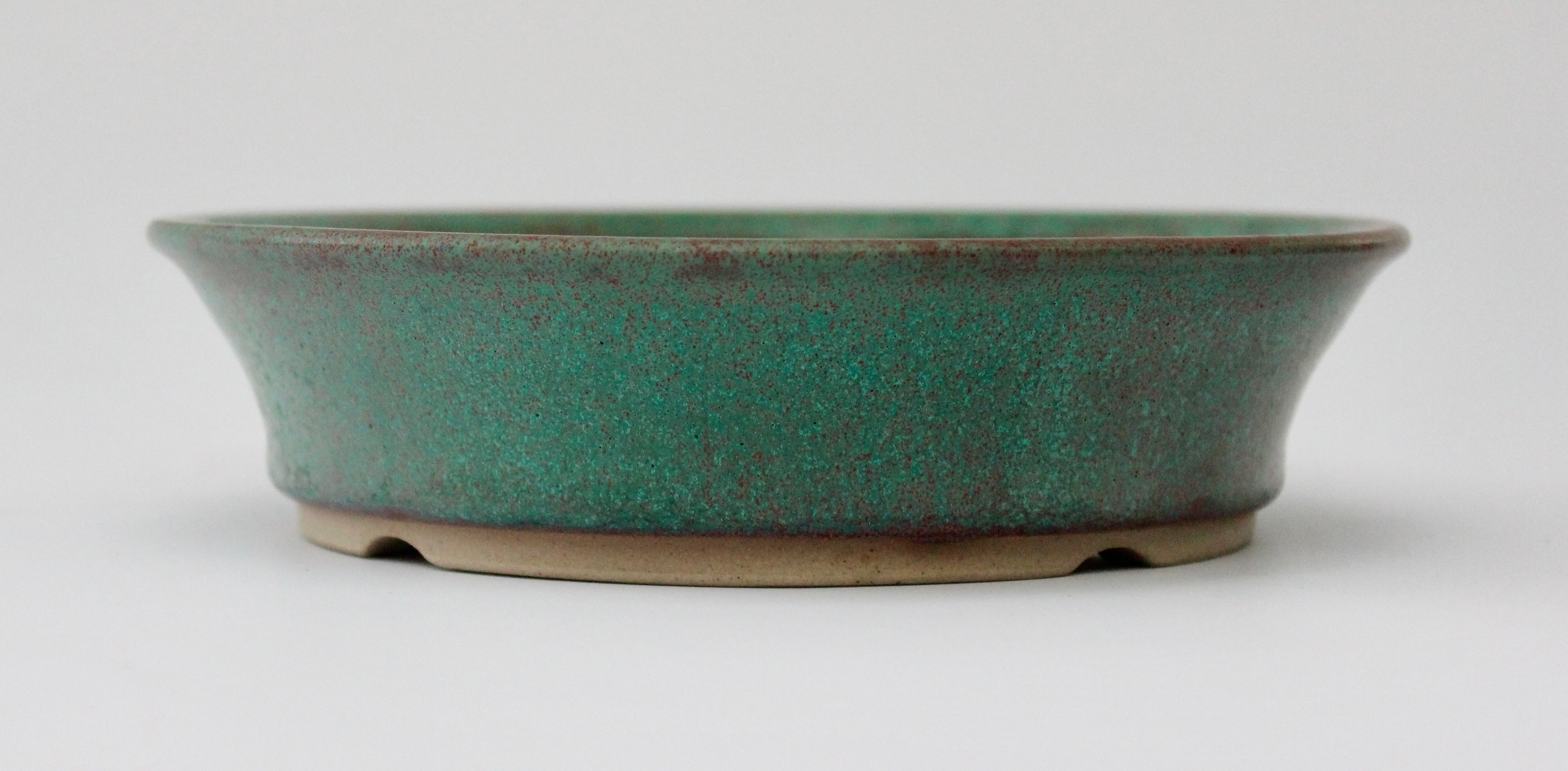 Round bonsai pot in a matte copper glaze. D.171mm