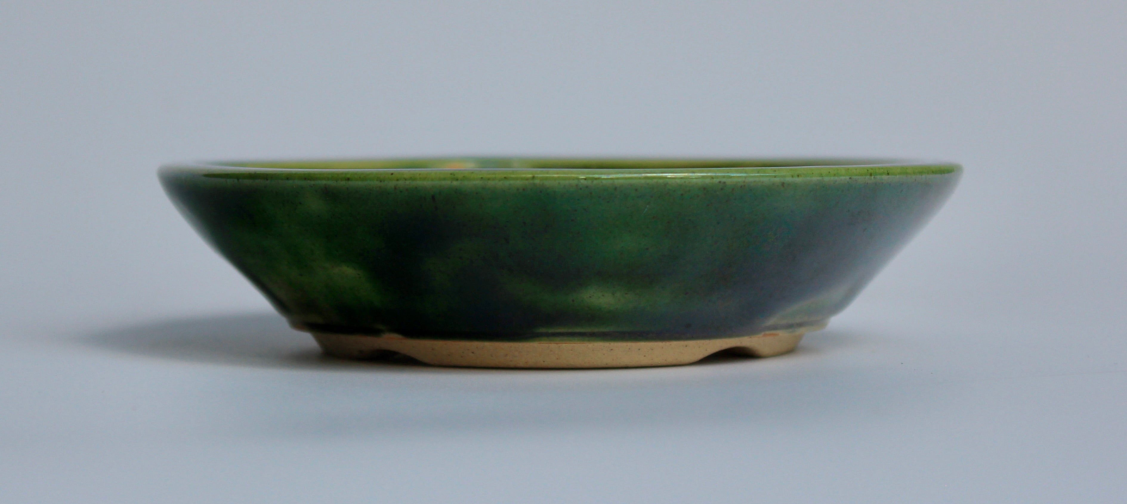 Round bonsai pot in a green oribe glaze 121mm