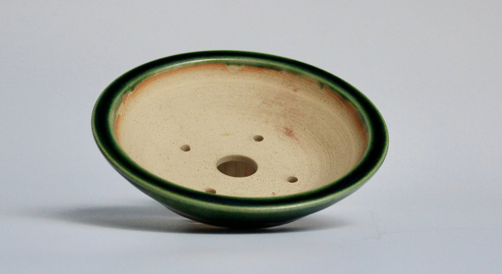 Round bonsai pot in a green oribe glaze 121mm
