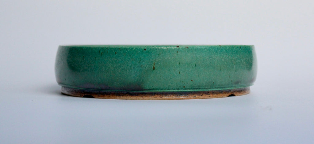 Round bonsai pot in a matte green glaze. D.163mm