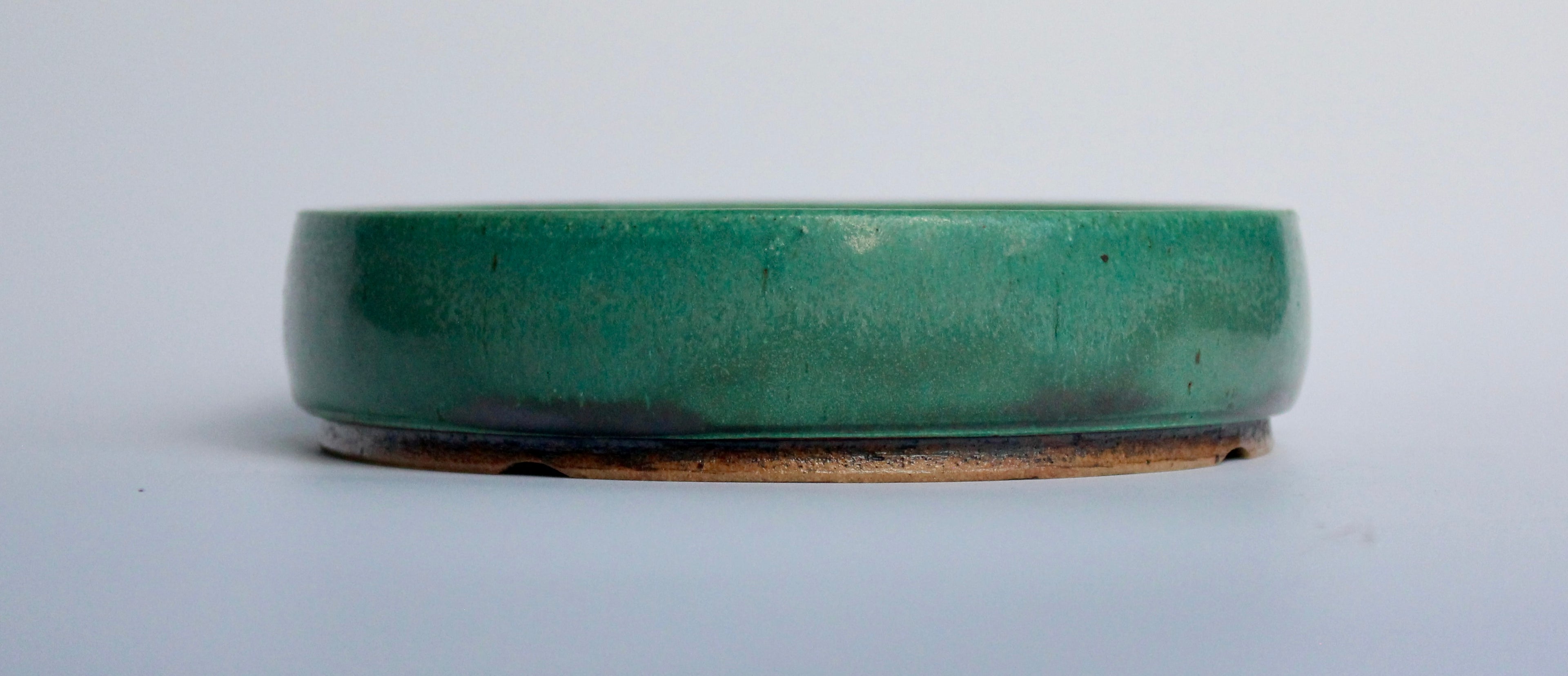 Round bonsai pot in a matte green glaze. D.163mm