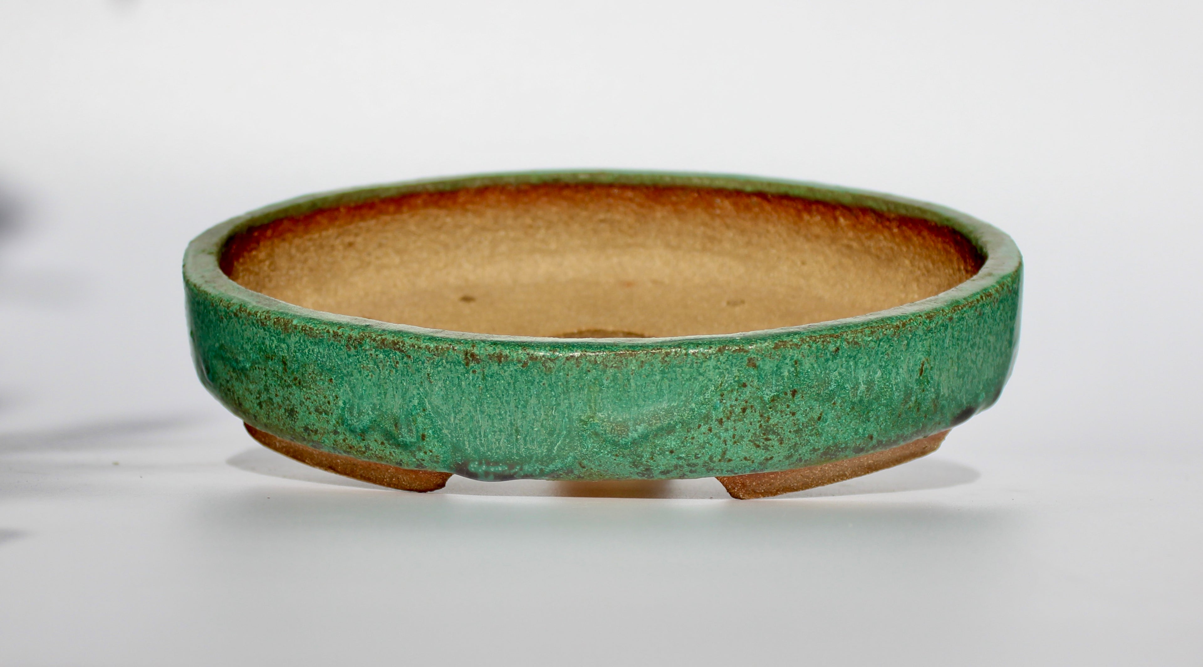 Oval bonsai pot in a matte green glaze 214x157mm