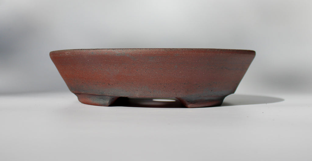 Round bonsai pot - unglazed in a red stoneware clay. D.211mm