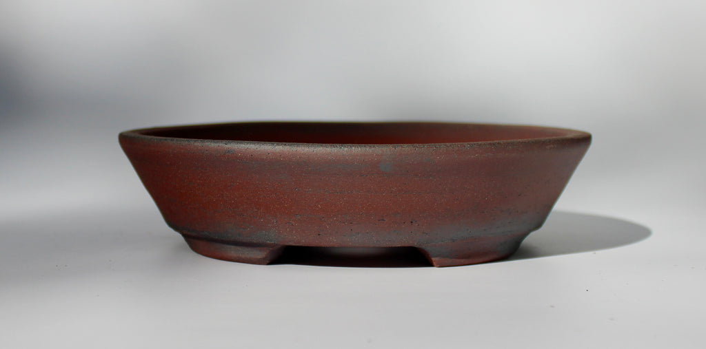 Round bonsai pot - unglazed in a red stoneware clay. D.211mm
