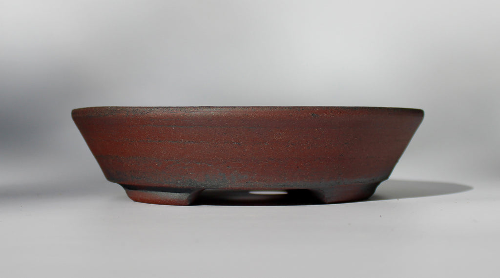 Round bonsai pot - unglazed in a red stoneware clay. D.211mm
