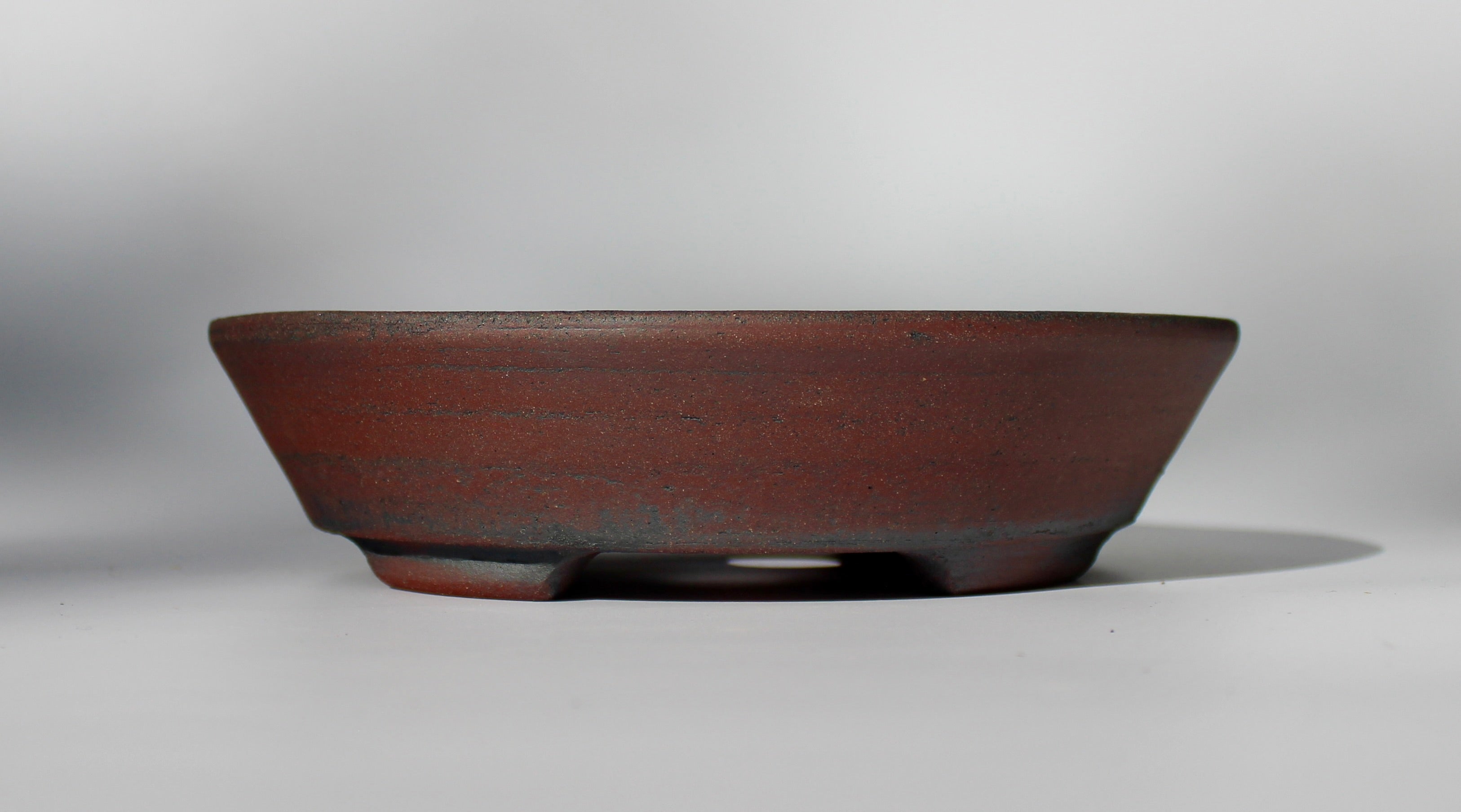 Round bonsai pot - unglazed in a red stoneware clay. D.211mm