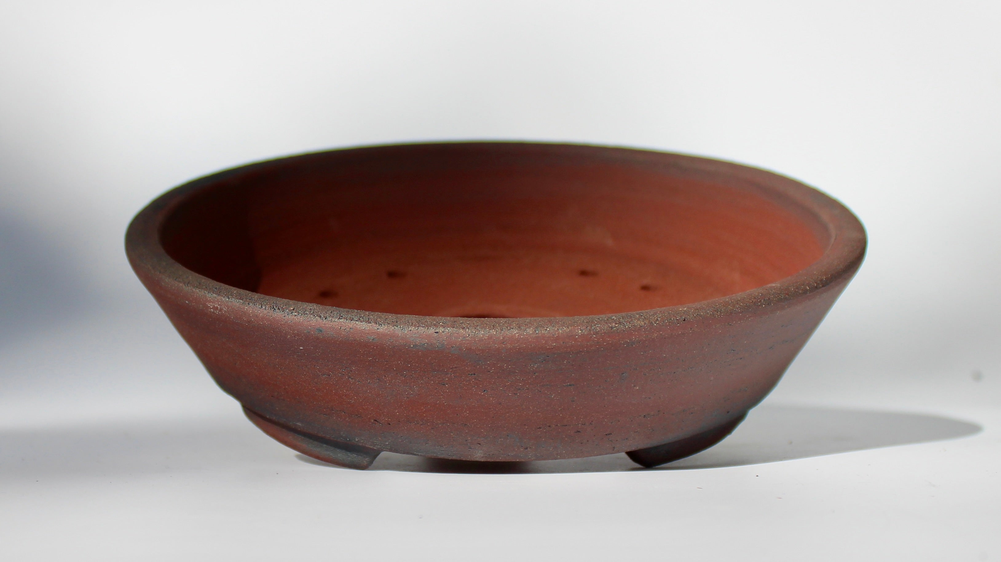 Round bonsai pot - unglazed in a red stoneware clay. D.211mm