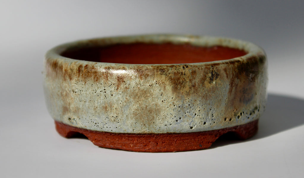 Round bonsai pot in a matte green glaze. D.80mm