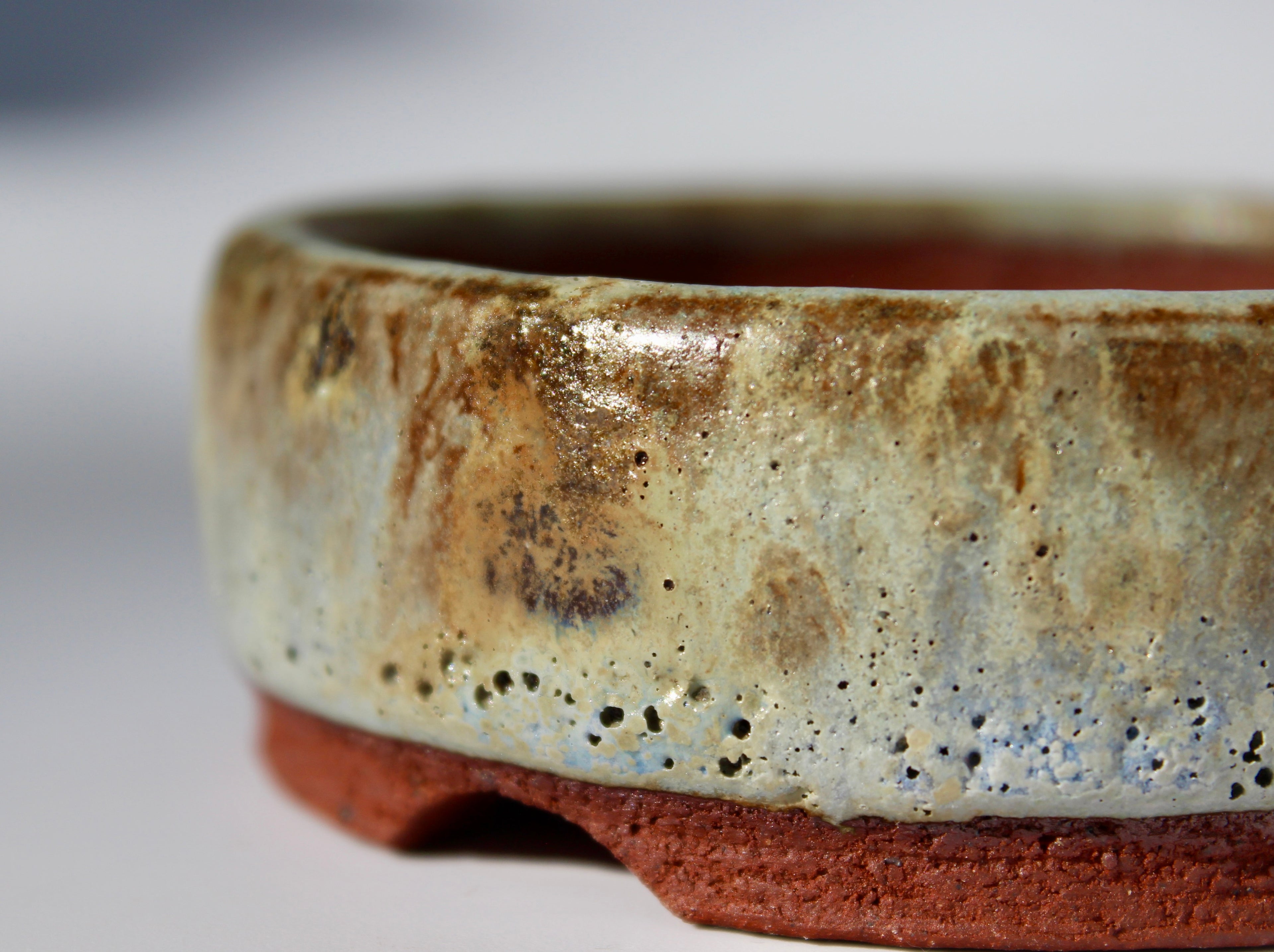 Round bonsai pot in a matte green glaze. D.80mm