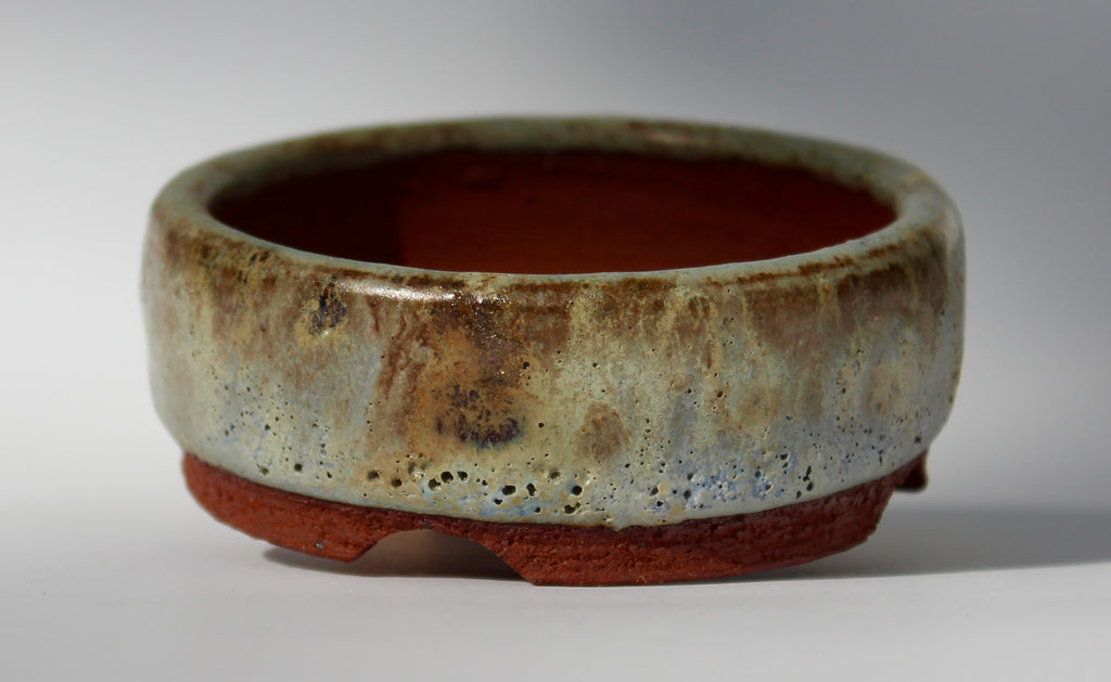 Round bonsai pot in a matte green glaze. D.80mm