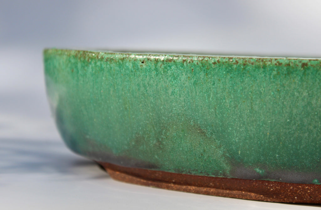 Oval bonsai pot in a matte copper green glaze 324x232mm