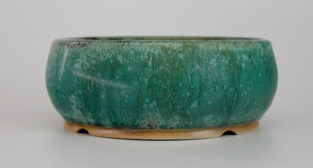 Round bonsai pot in a matte green glaze. D.150mm