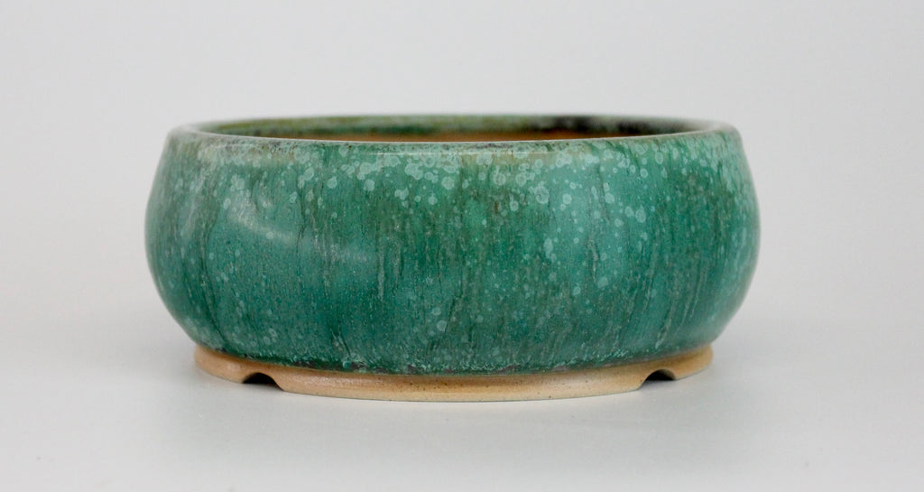 Round bonsai pot in a matte green glaze. D.150mm
