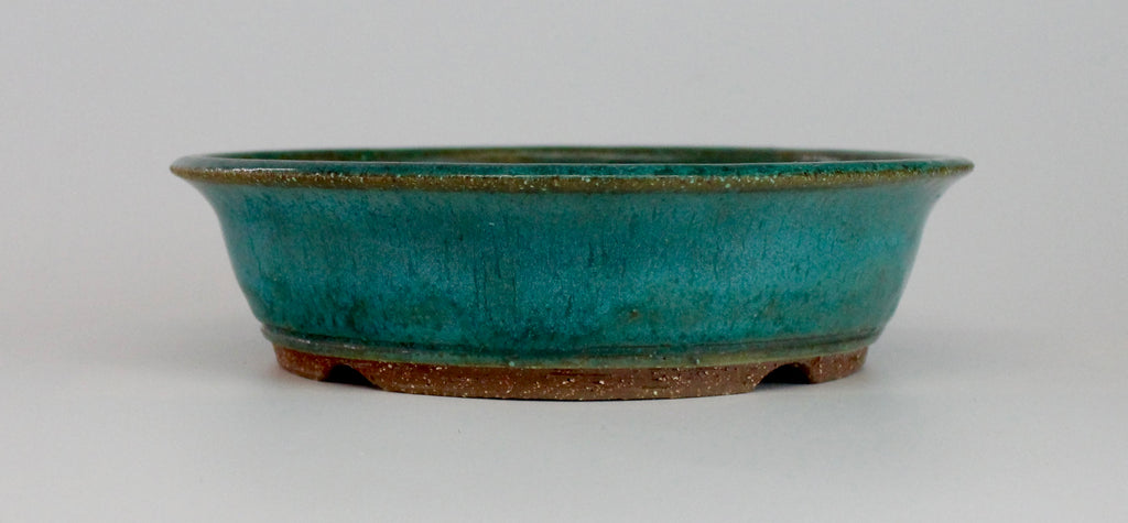 Round bonsai pot in a matte blue glaze. D.185mm