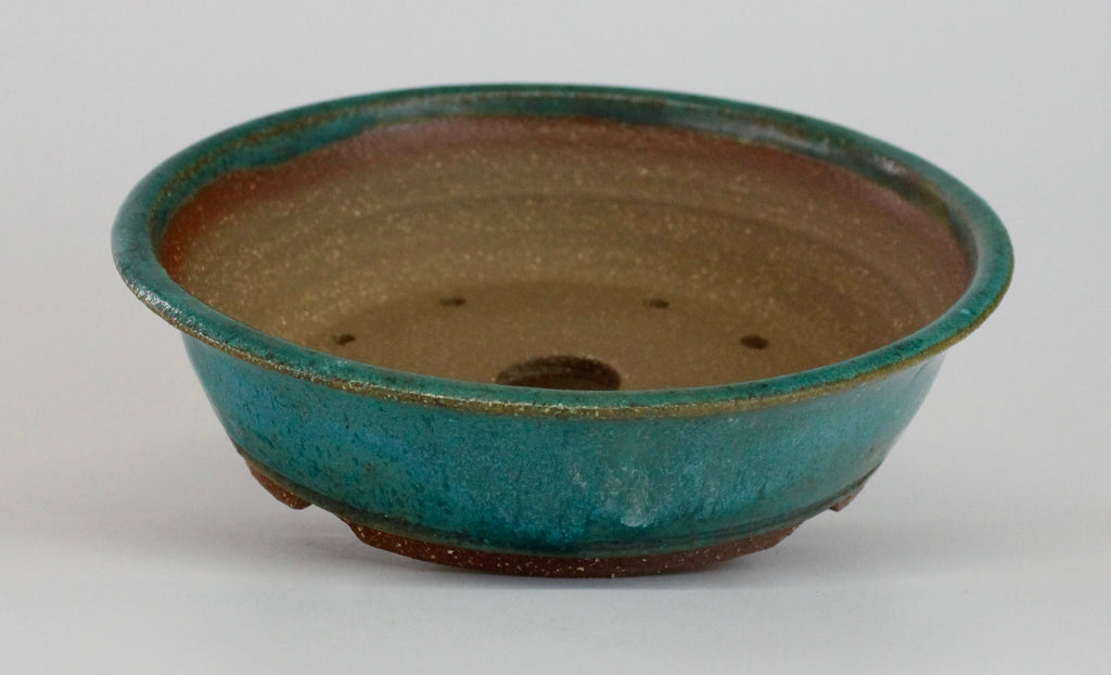 Round bonsai pot in a matte blue glaze. D.185mm