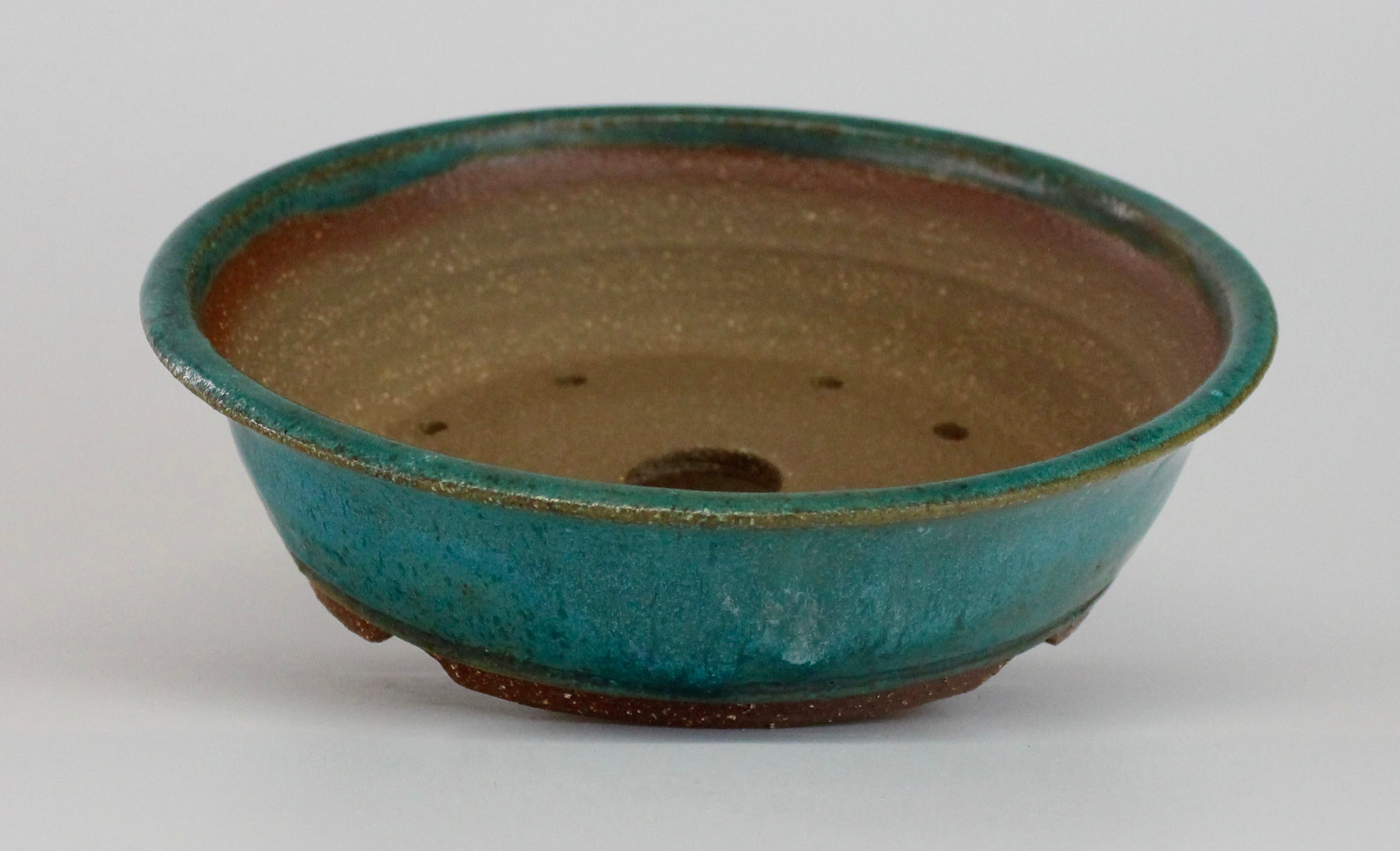Round bonsai pot in a matte blue glaze. D.185mm