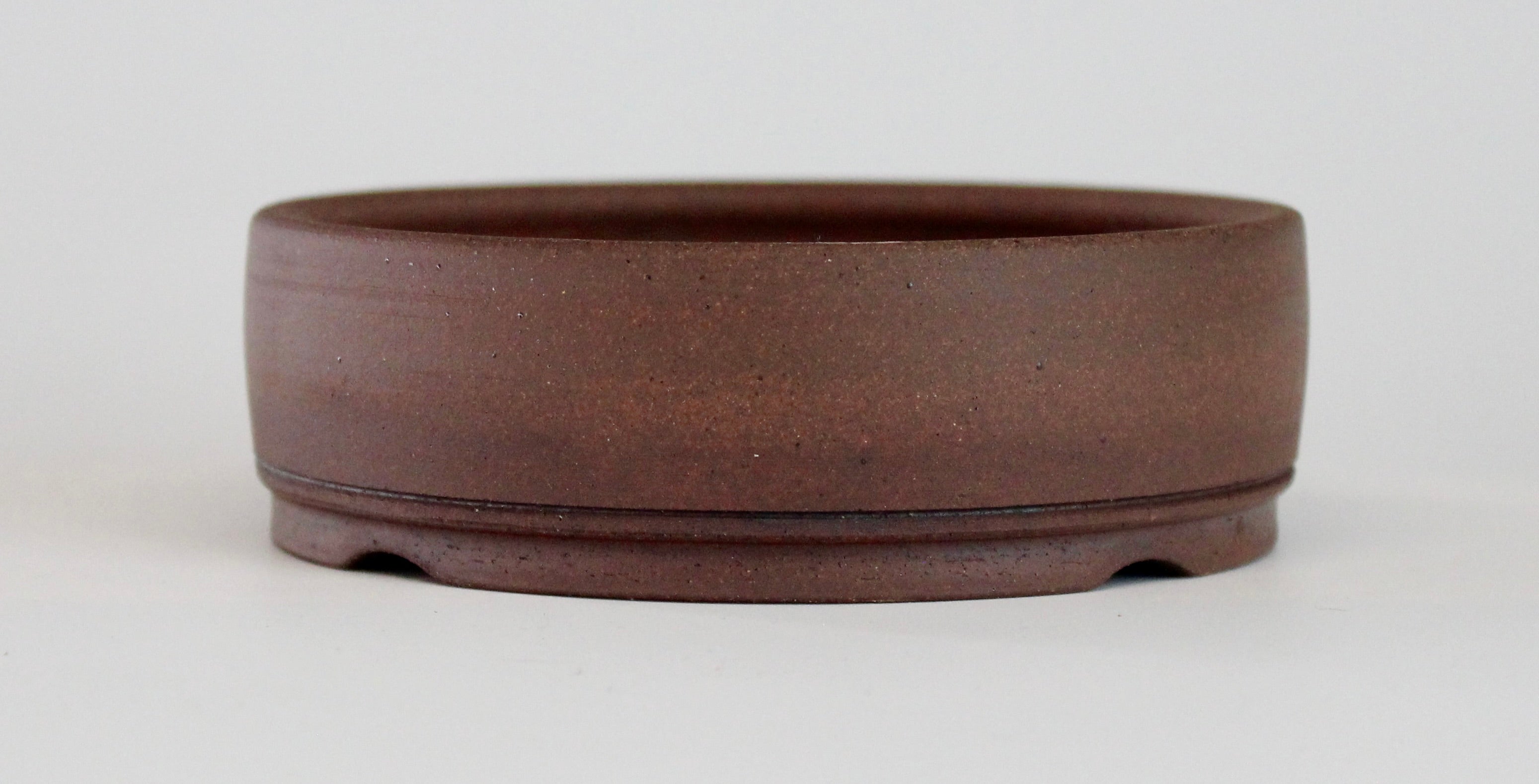 Round unglazed bonsai pot. D.111mm