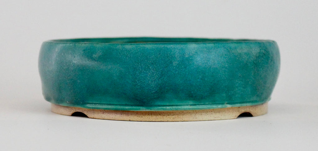 Round bonsai pot in a matte blue glaze. D.127mm