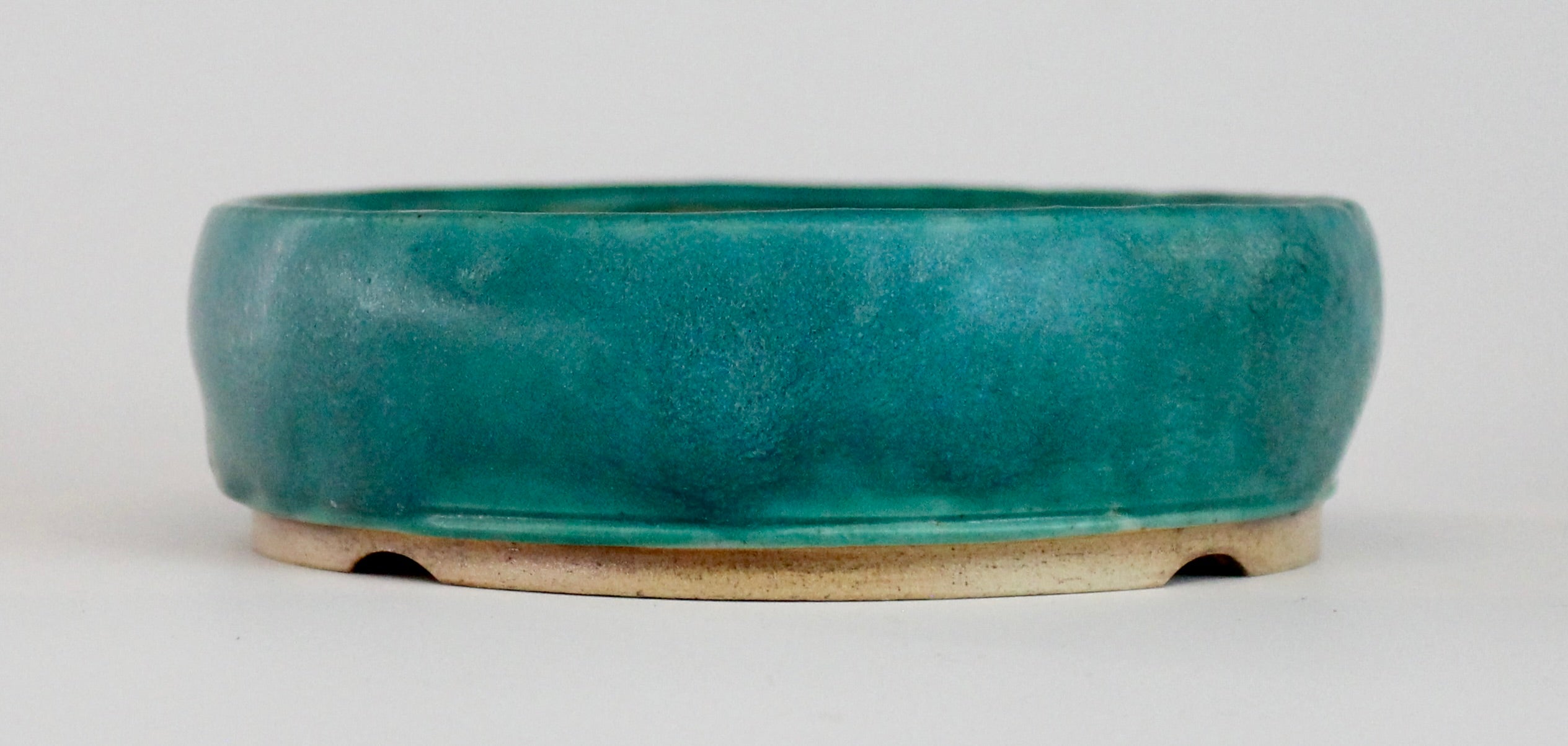 Round bonsai pot in a matte blue glaze. D.127mm