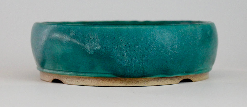 Round bonsai pot in a matte blue glaze. D.127mm