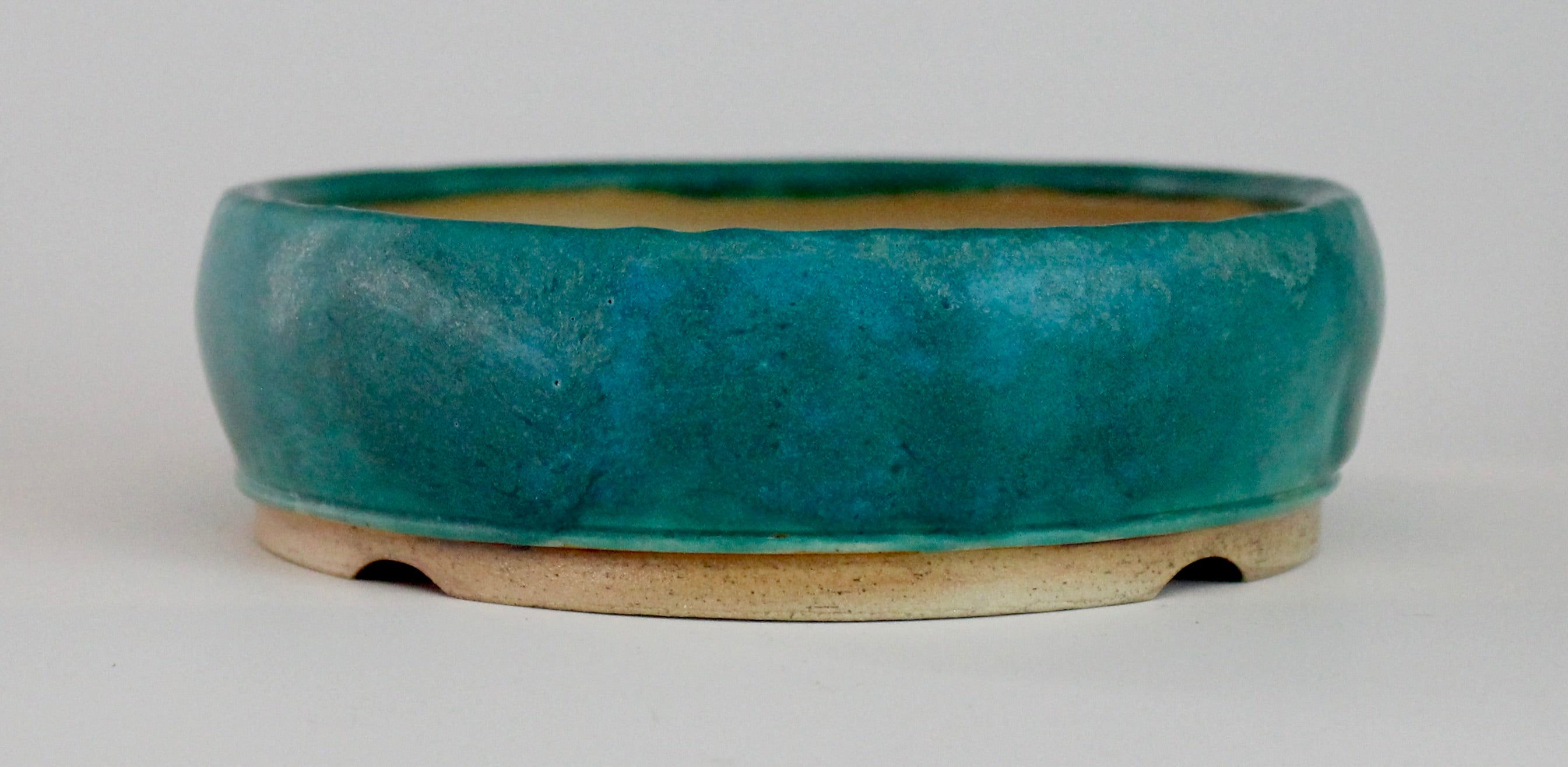 Round bonsai pot in a matte blue glaze. D.127mm