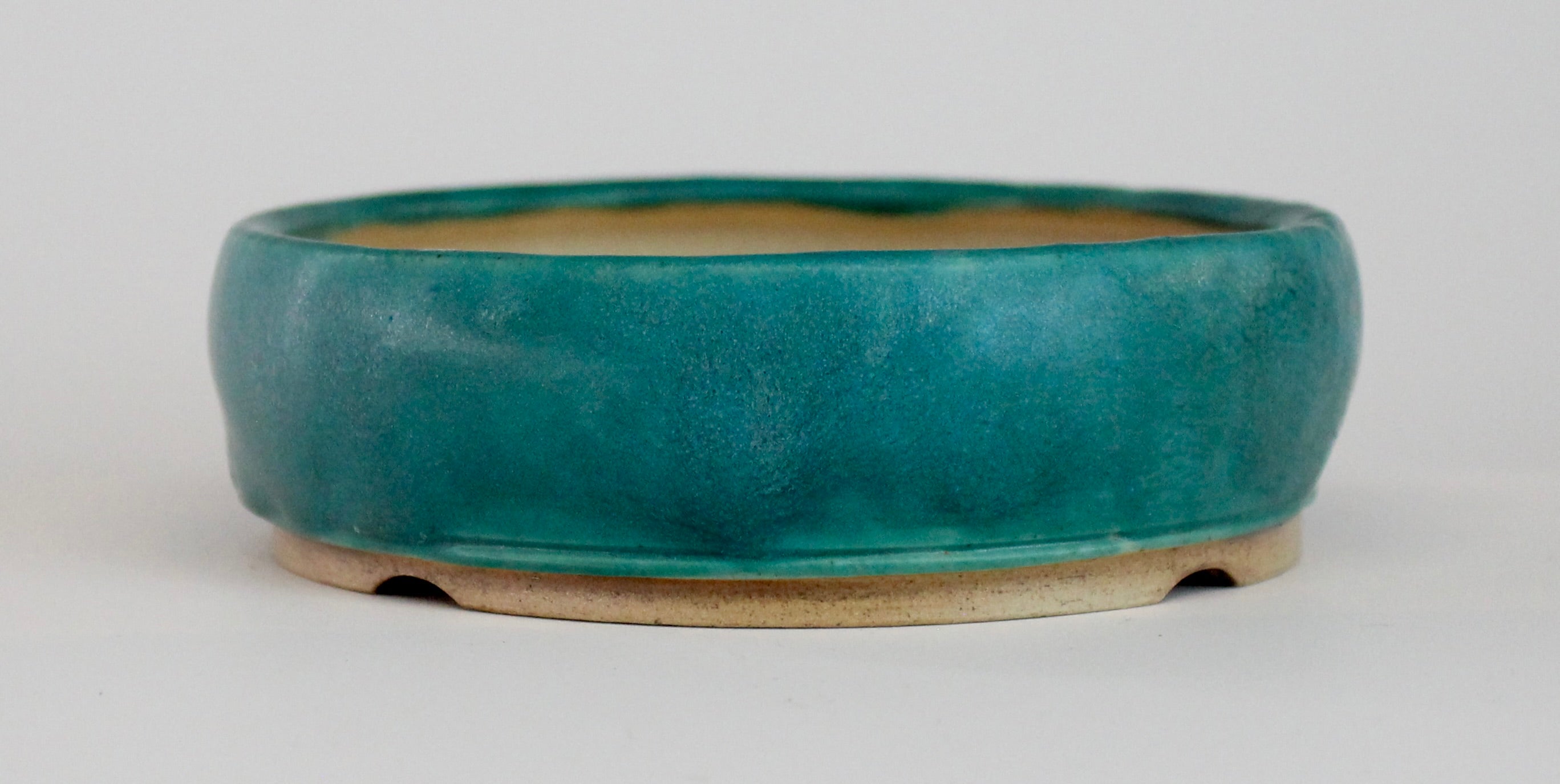 Round bonsai pot in a matte blue glaze. D.127mm