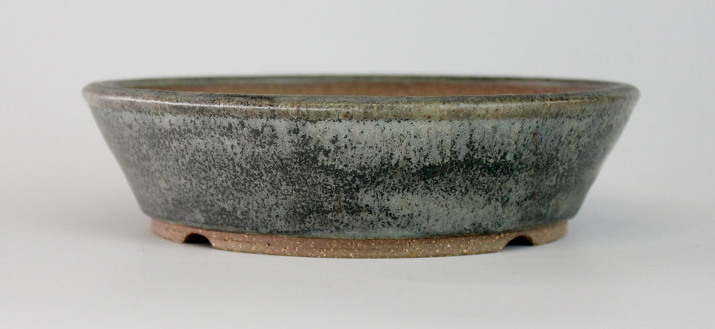 Round bonsai pot in a matte mottled grey glaze. D.190mm