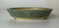 Round bonsai pot in a matte green glaze. D.148mm