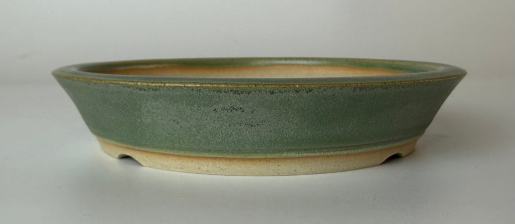 Round bonsai pot in a matte green glaze. D.148mm