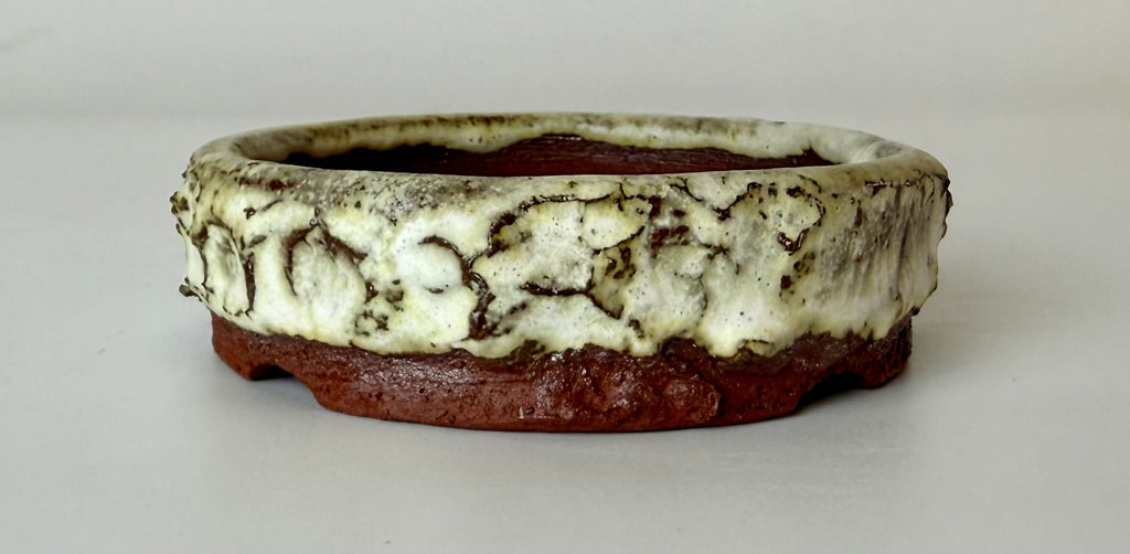 Round bonsai pot in a matte white glaze. D.93mm