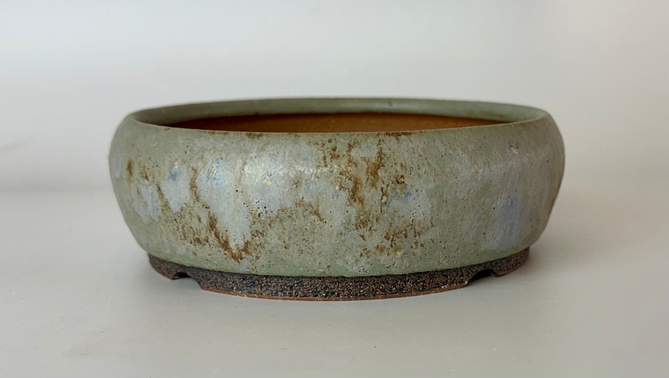 Round bonsai pot in a blue glaze. D.175mm