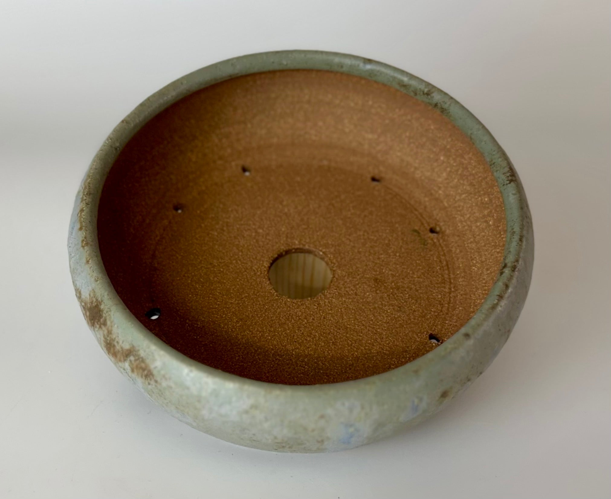 Round bonsai pot in a blue glaze. D.175mm