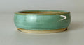 Round bonsai pot in a green glaze. D.79mm