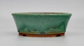 Round bonsai pot in a matte green copper glaze. D.159mm