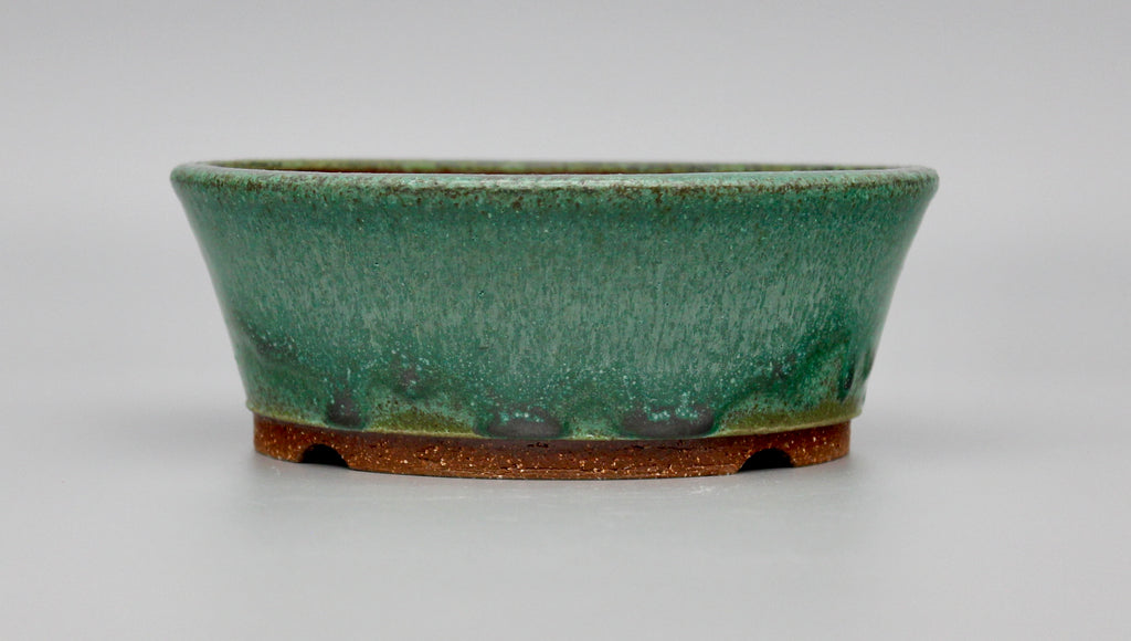 Round bonsai pot in a matte green copper glaze. D.159mm